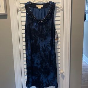 Adorable, comfortable dress with front neck embellishments